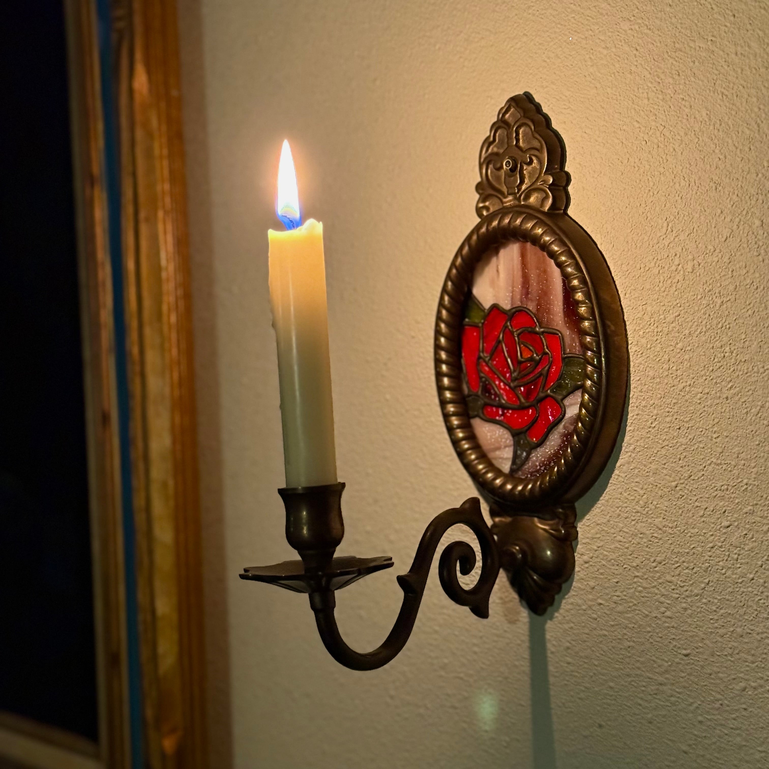 Rose in vintage brass wall sconce