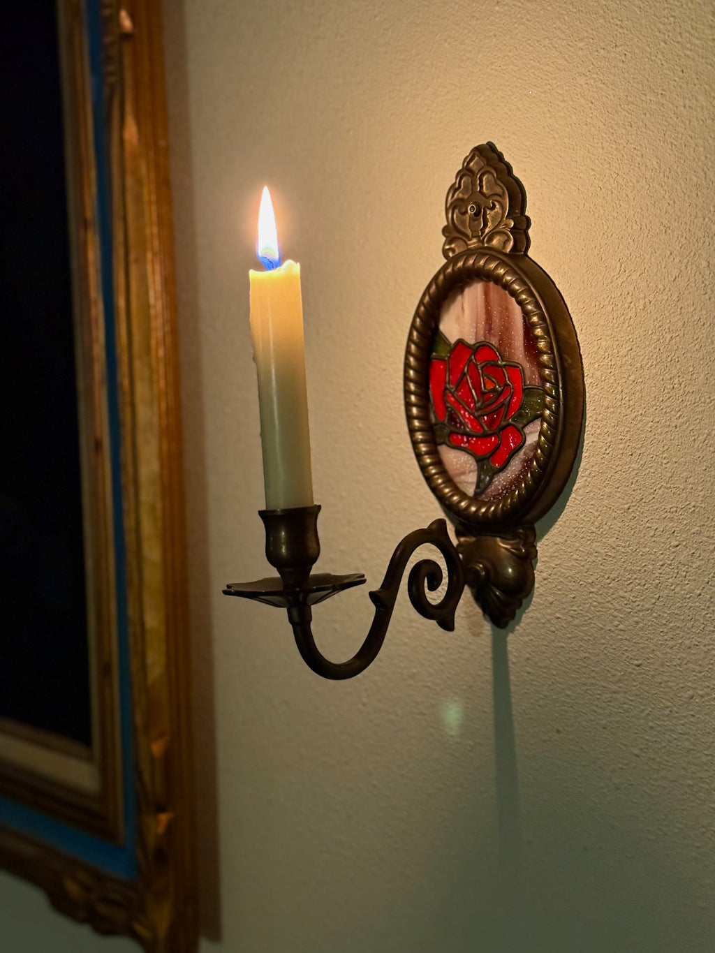 Rose in vintage brass wall sconce