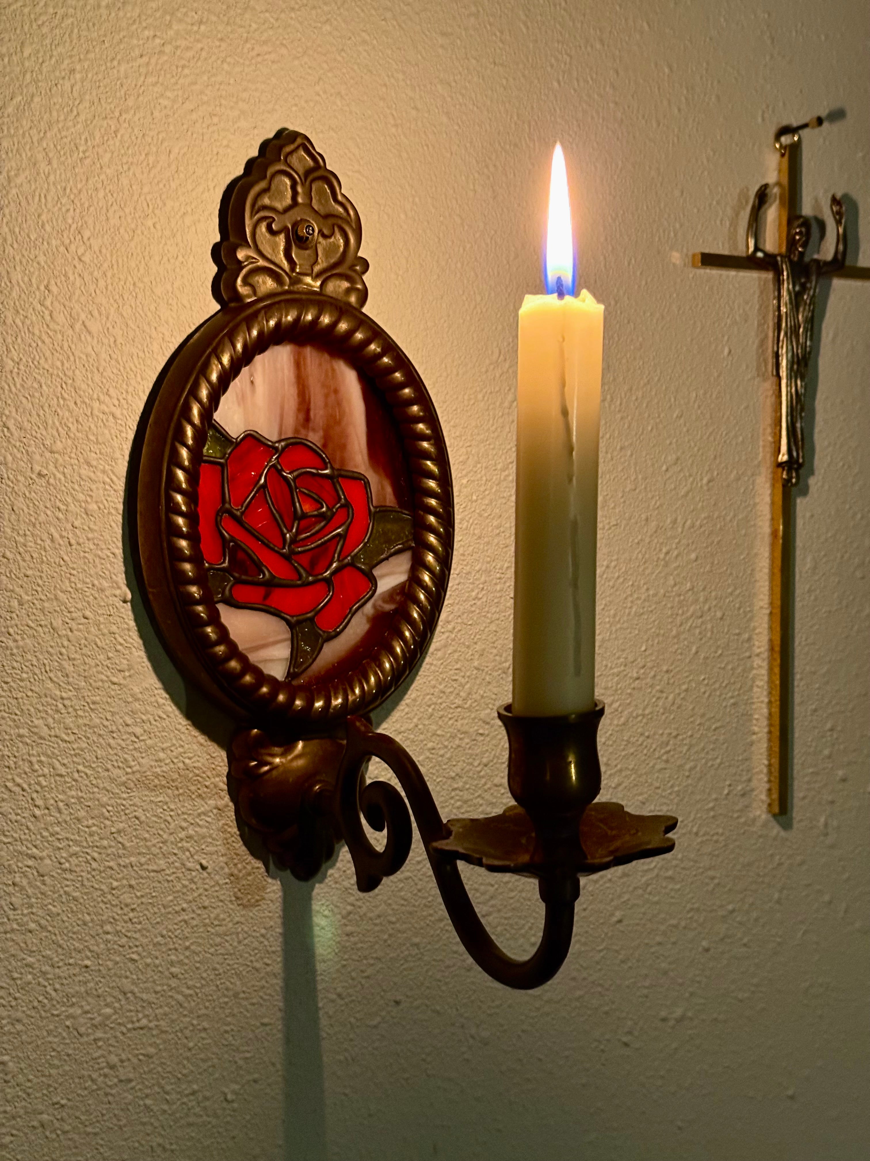 Rose in vintage brass wall sconce